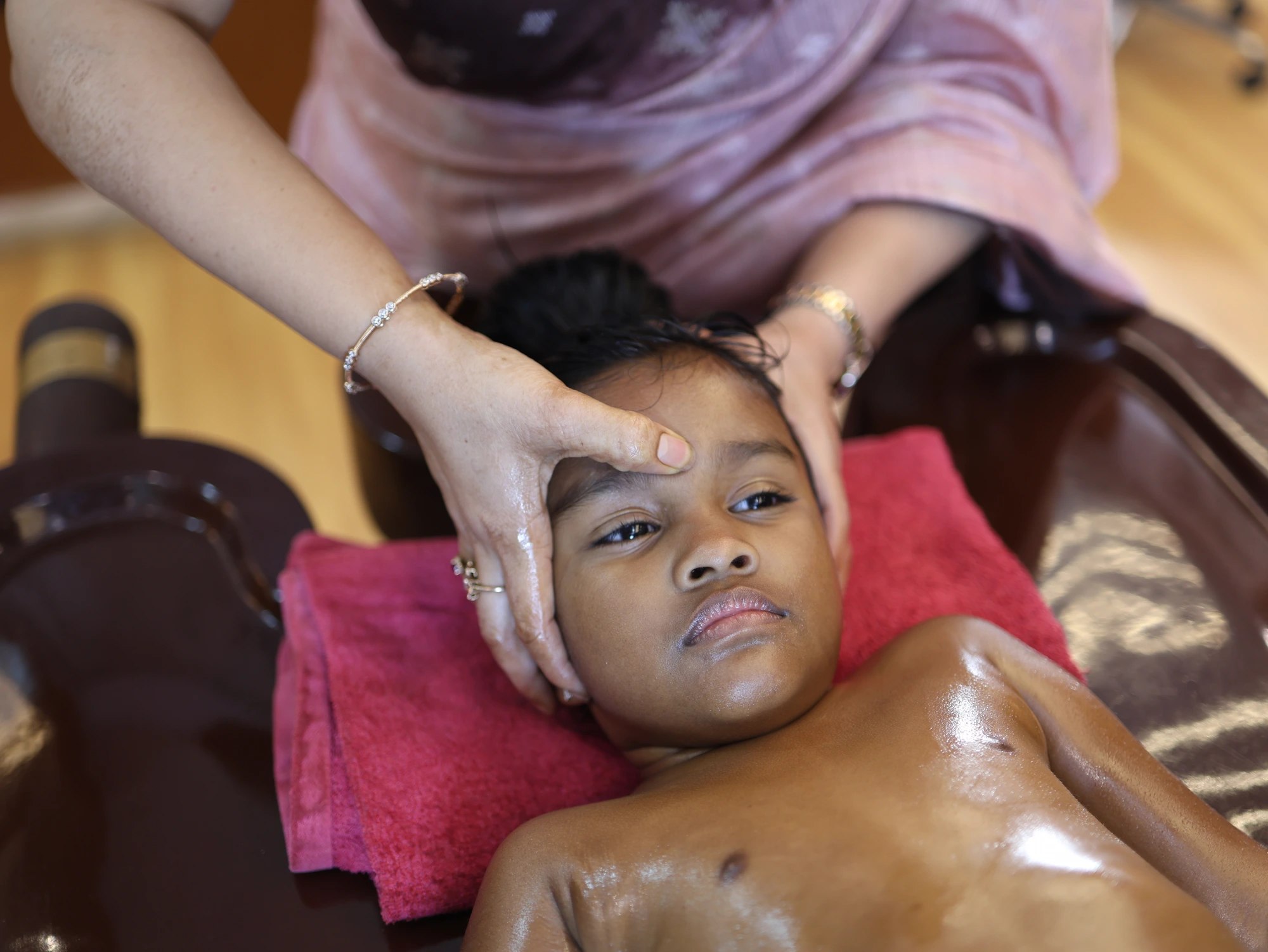 Personalized Marma point guidance for children at Sree Prathama Ayurvedam